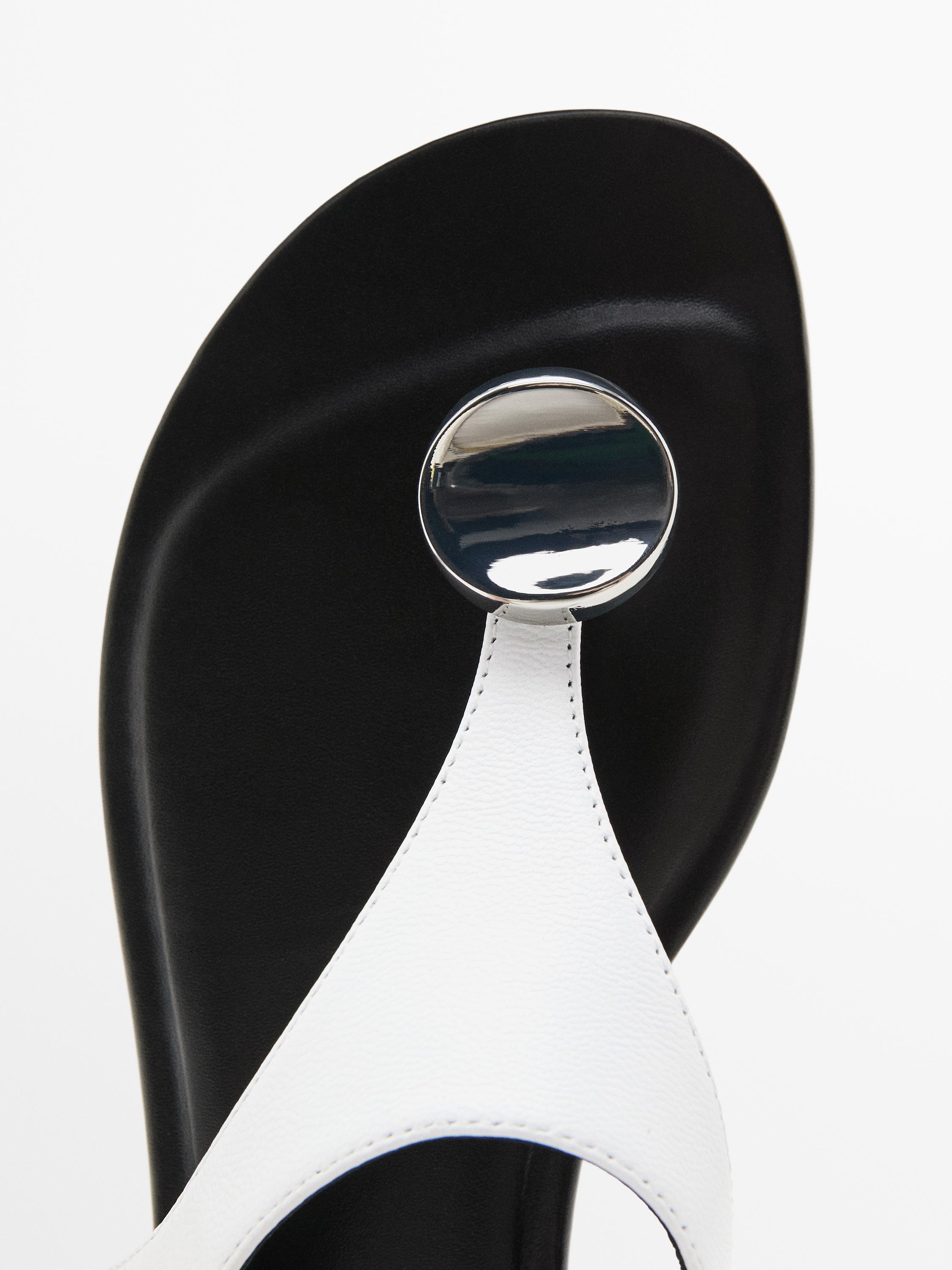 Flat leather sandals with embellished detail